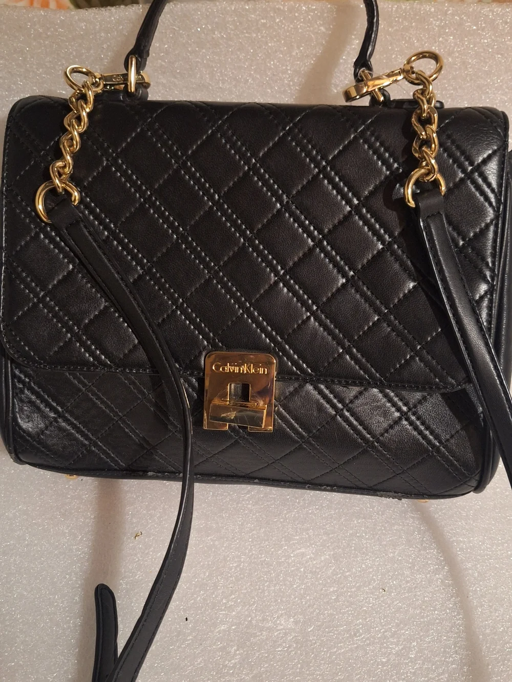 Black Quilted Satchel Handbag with Gold Hardware